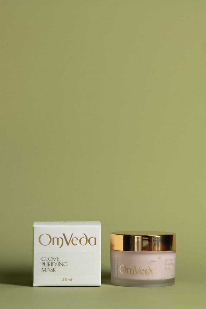 OmVeda clove purifying face mask set with cream jar and white box