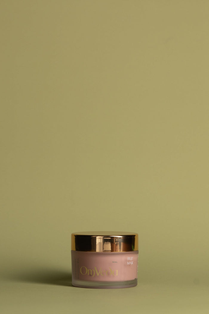 OmVeda Fruit Mask 50ml jar with gold lid and pink translucent cream