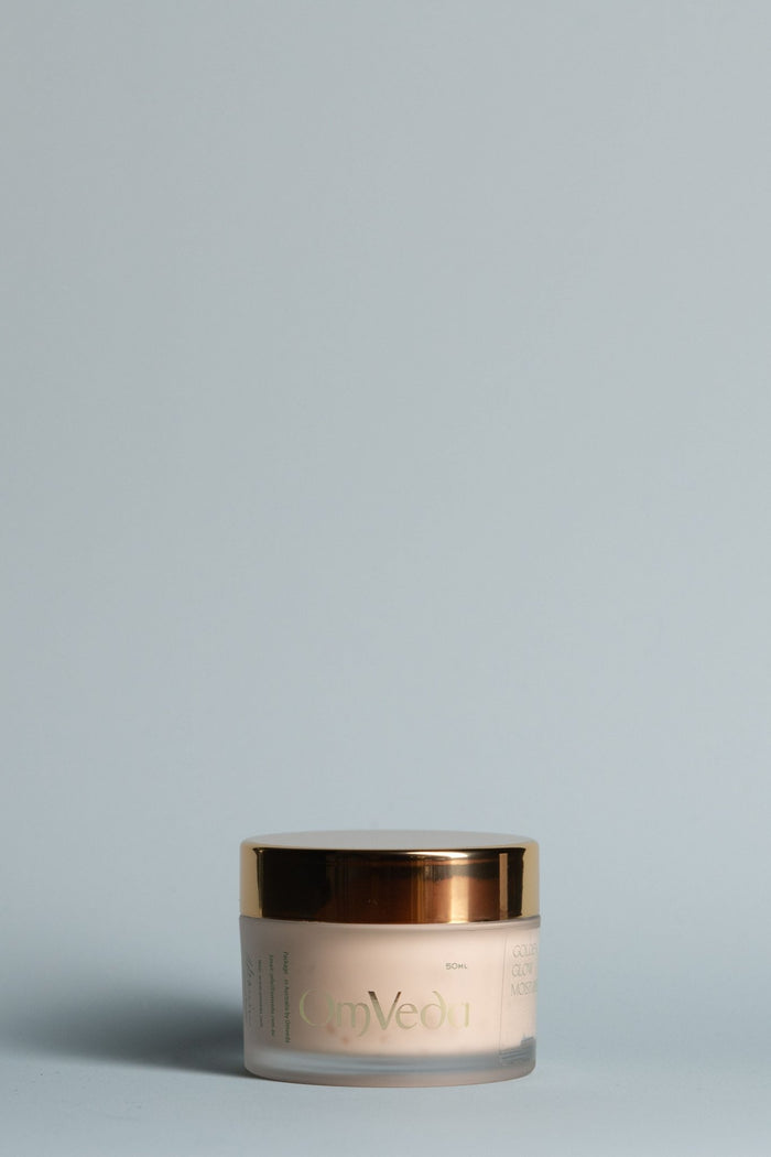 OmVeda Golden Glow moisturiser jar with gold lid