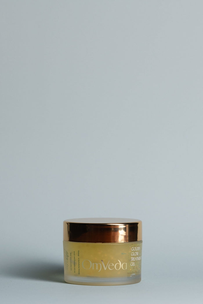 OmVeda Golden Glow treatment gel jar with gold lid