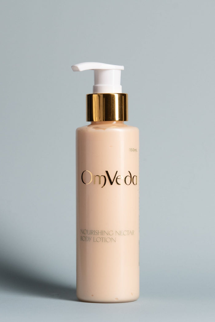OmVeda Nourishing Nectar body lotion pump bottle with light beige liquid