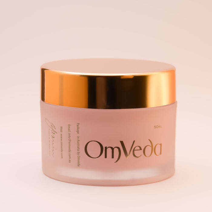 OmVeda protective base jar with gold lid, large OmVeda logo on pink, 50 ml