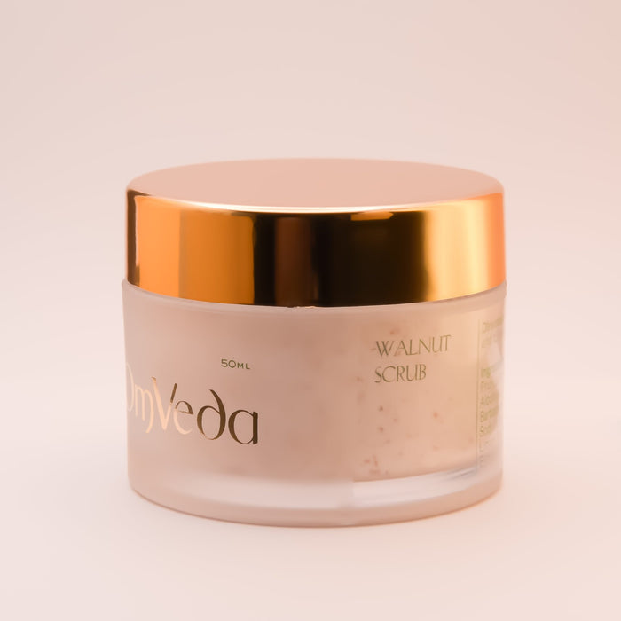 OmVeda walnut scrub jar with gold lid, cream jar showing side label