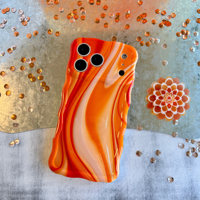 Orange Crush MagSafe iPhone case with swirled marble pattern in sunset orange by Fancy Bands