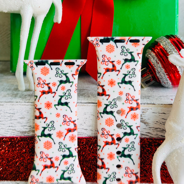 Reindeer Waltz Apple Watch band with dancing reindeer in red and green on white background with Christmas decorations
