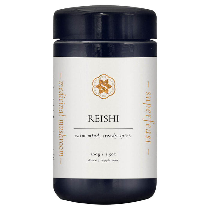 Supplement container labeled 'Reishi' by 'superfeast' on a white background