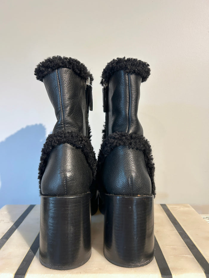 Simon Miller Low Raid black leather ankle boots with shearling trim and side zip, size 40, displayed on a neutral background.