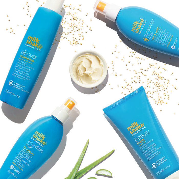 milk_shake summer products including shampoo, sunscreen, and hair mist on a white background with visible branding.