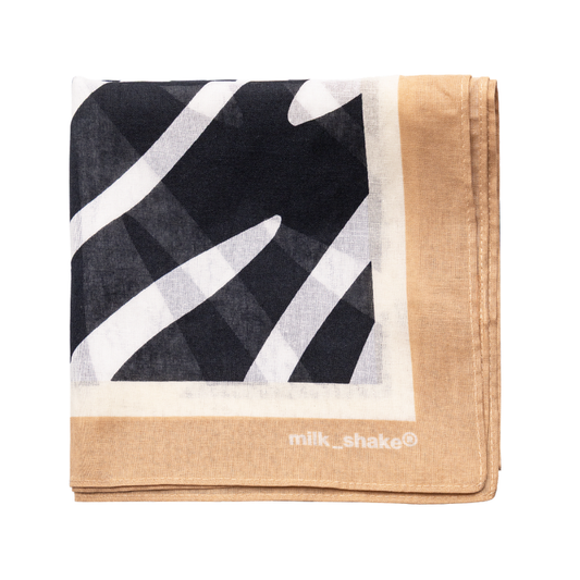 bandana with black, white, and beige design on a white background with milk_shake logo