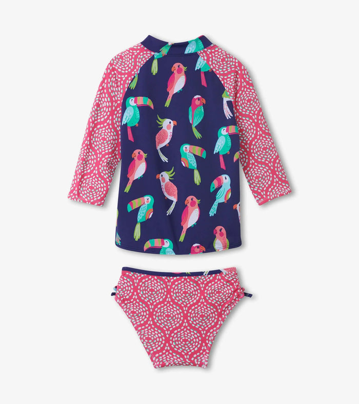 Hatley girls Tropical Birds rashguard set in Navy/Pink with 3/4 sleeve zip swim top and bikini bottom