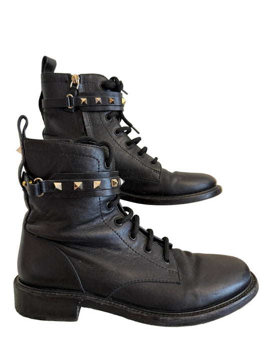 Valentino Rock Stud Combat Boots in size 38.5 with studded details and rugged design, stylish footwear for edgy fashion.