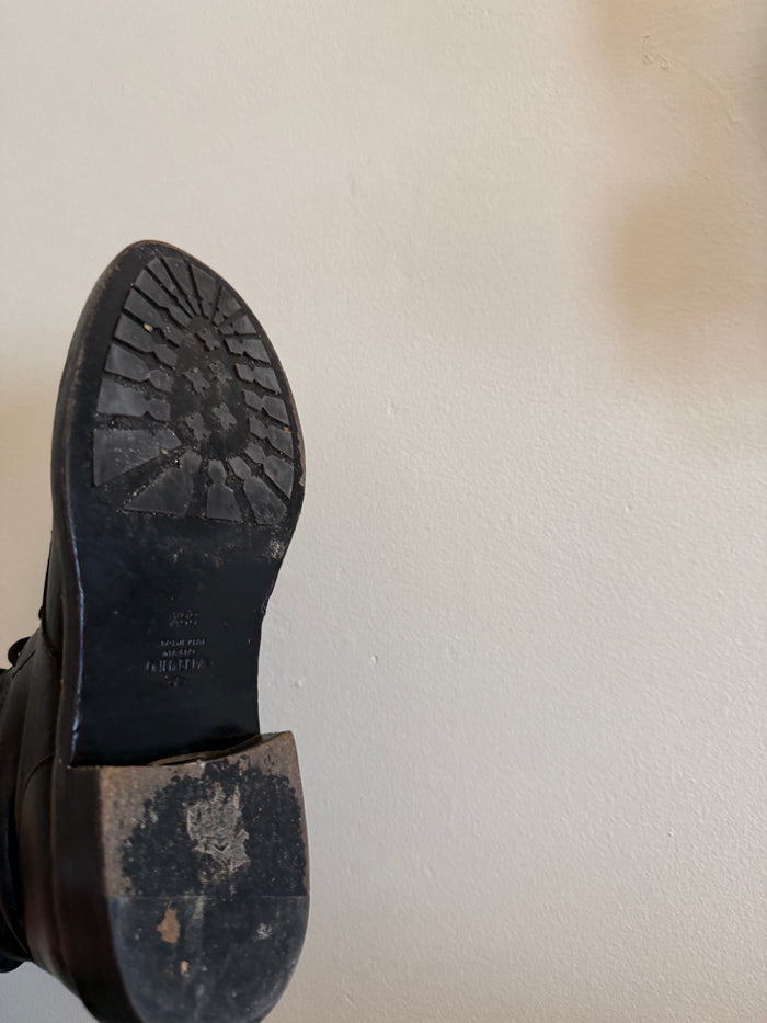 Valentino Rock Stud Combat Boots size 38.5 with black leather and signature stud embellishments, front view.