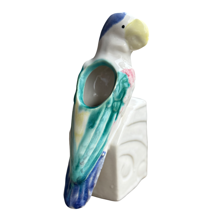 Decorative parrot-shaped object on a white background