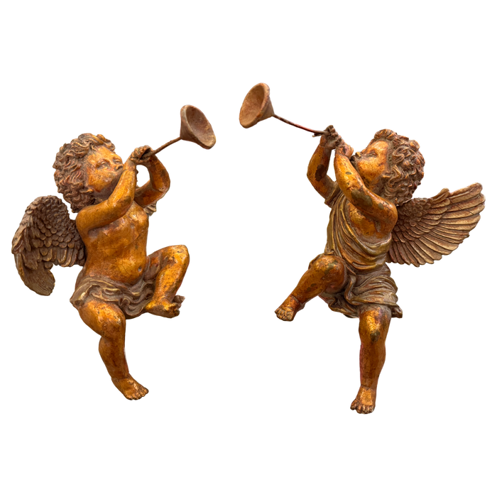 vintage cherub statues, cherub trumpet figures, angel figurines vintage, gilt cherub decor, European vintage decor, classical angel statues, sculptural home decor, collected interior decor, vintage angel pair, mantel decor accents, bookshelf styling decor
