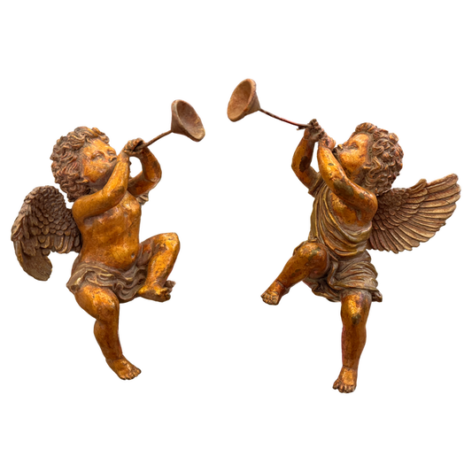 vintage cherub statues, cherub trumpet figures, angel figurines vintage, gilt cherub decor, European vintage decor, classical angel statues, sculptural home decor, collected interior decor, vintage angel pair, mantel decor accents, bookshelf styling decor