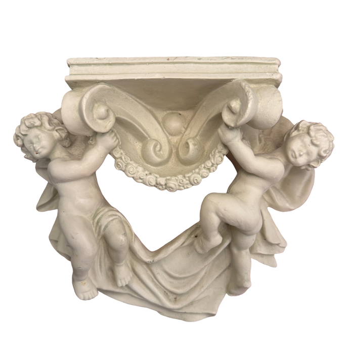 vintage cherub wall shelf, putti wall shelf, Italian stone wall decor, Gino Ruggeri sculpture, vintage Italian wall art, cherub wall decor, antique style wall shelf, sculptural wall decor, European vintage decor, collected interior decor, classical wall art, vintage shelf decor
