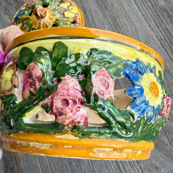 Decorative bracelet with floral design on a wooden surface