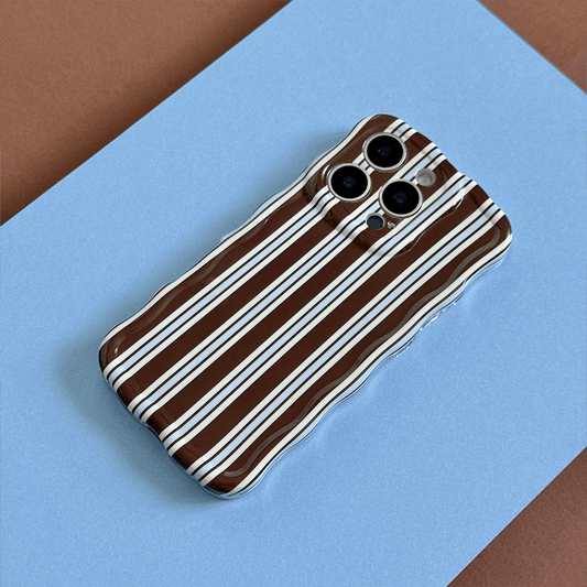 Phone Case with brown and white vertical stripes on a blue background.