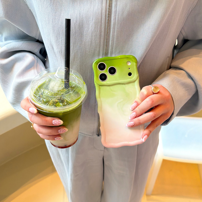 Girl holding matcha and wavy phone case strawberry matcha